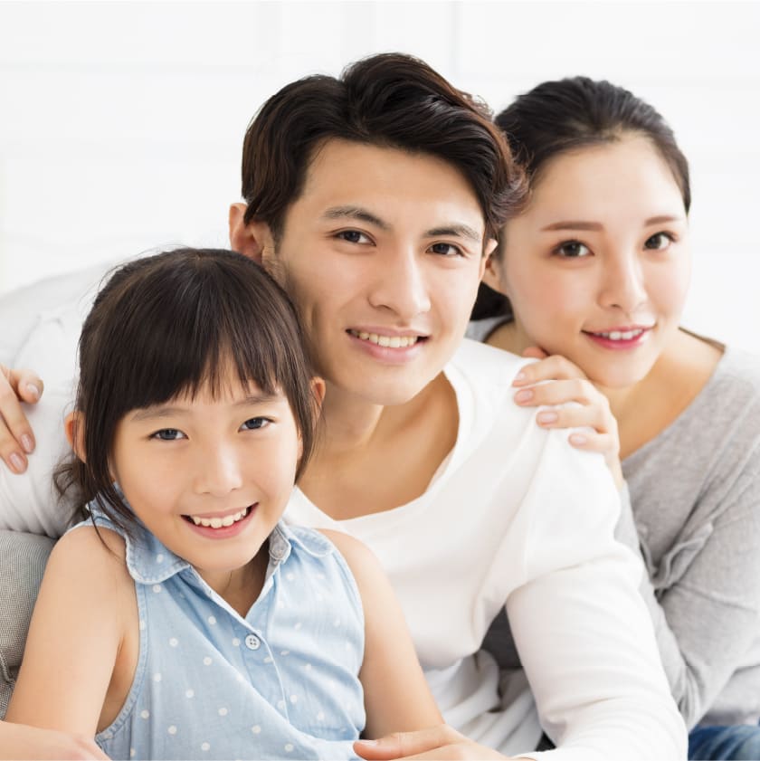 https://kokuasmiles.tradebuilderinc.com"Image depicting a family involved in gum disease treatment, emphasizing a collaborative approach to oral health | Kokua Smile
